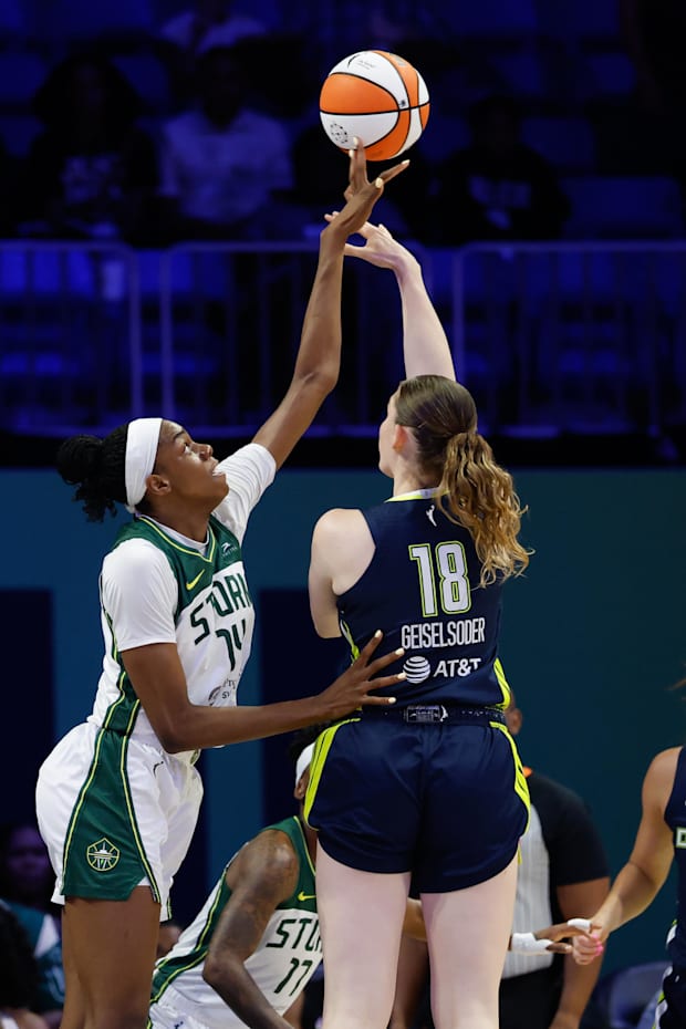 Dallas Wings center Luisa Geiselsoder has her shot blocked by Seattle Storm center Dominique Malonga