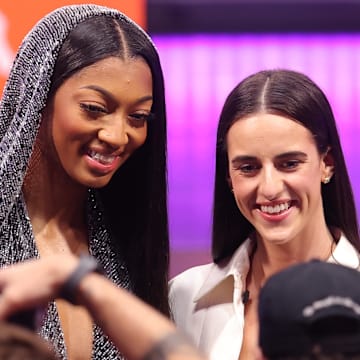 Apr 15, 2024; Brooklyn, NY, USA; Angel Reese and Caitlin Clark pose for photos before the 2024 WNBA Draft at Brooklyn Academy of Music.