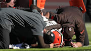 Cleveland Browns quarterback Deshaun Watson is checked on by medical staff after an injury during a game against the Cincinnati Bengals on Oct. 20, 2024, in Cleveland, Ohio.