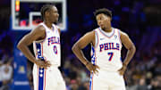 Nov 2, 2024; Philadelphia, Pennsylvania, USA; Philadelphia 76ers guard Tyrese Maxey (0) talks with guard Kyle Lowry (7) during the third quarter against the Memphis Grizzlies at Wells Fargo Center. Mandatory Credit: Bill Streicher-Imagn Images