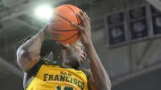 Jan 25, 2024; Spokane, Washington, USA; San Francisco Dons forward Jonathan Mogbo (10) rebounds the ball 
against the Gonzaga Bulldogs in the first half at McCarthey Athletic Center. Mandatory Credit: James Snook-USA TODAY Sports