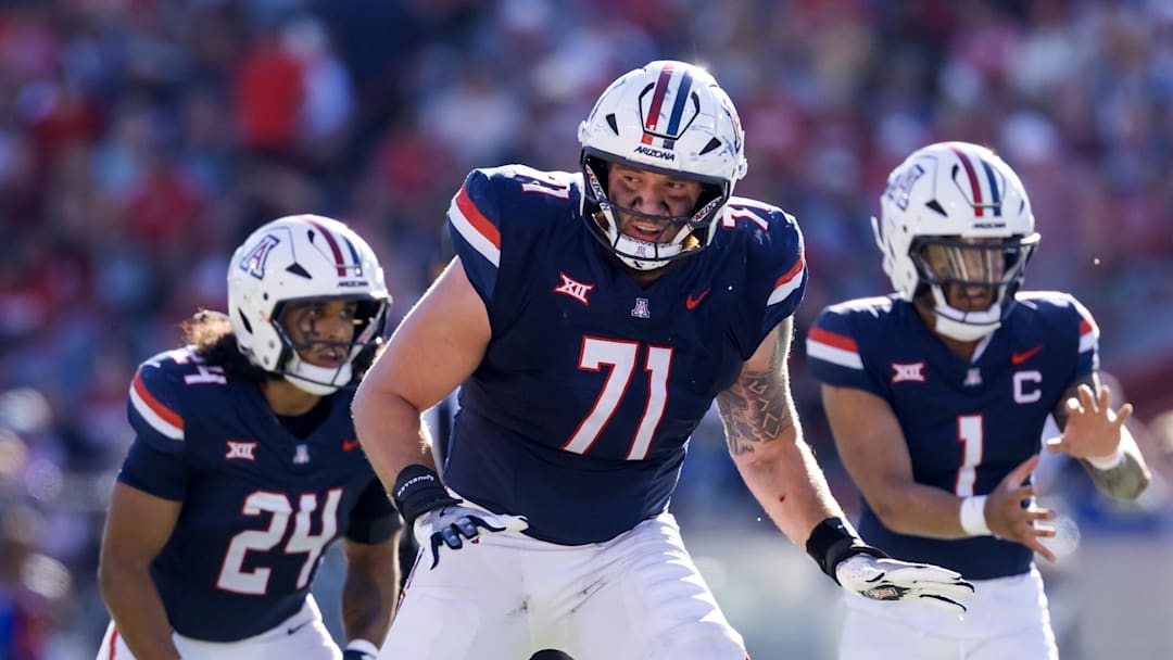 Nov 8, 2025; Tucson, Arizona, USA; Arizona Wildcats offensive lineman Tristan Bounds (71) against the Kansas Jayhawks at Arizona Stadium. Mandatory Credit: Mark J. Rebilas-Imagn Images