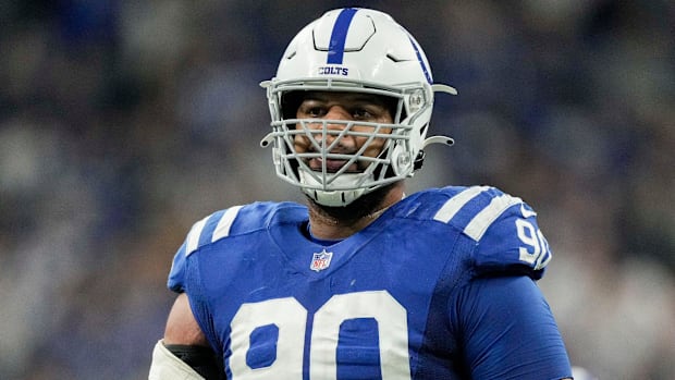 Colts defensive tackle Grover Stewart (blue jersey; white helmet) waits for the next offensive snap. 