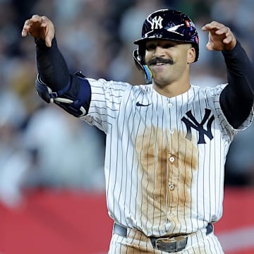 Oct 1, 2025; Bronx, New York, USA; New York Yankees center fielder Trent Grisham (12) celebrates his double against the Boston Red Sox during the seventh inning of game two of the Wildcard round of the 2025 MLB playoffs at Yankee Stadium. Mandatory Credit: Brad Penner-Imagn Images