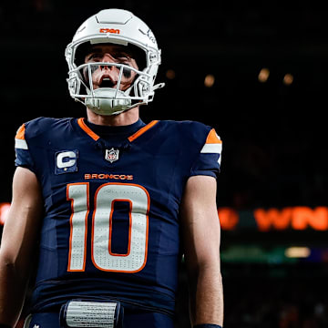 Dec 2, 2024; Denver, Colorado, USA; Denver Broncos quarterback Bo Nix (10) reacts after a play in the third quarter against the Cleveland Browns at Empower Field at Mile High.