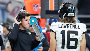 Nov 23, 2025; Glendale, Arizona, USA; Jacksonville Jaguars offensive coordinator Grant Udinski with quarterback Trevor Lawrence (16) against the Arizona Cardinals at State Farm Stadium. Mandatory Credit: Mark J. Rebilas-Imagn Images