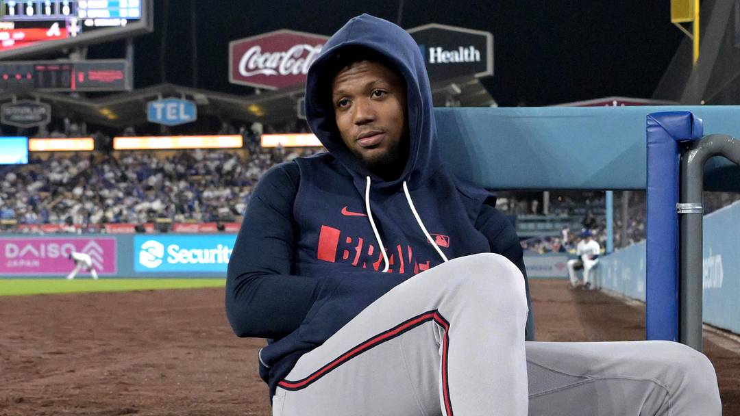 May 8, 2026; Los Angeles, California, USA;  Atlanta Braves Ronald Acuña Jr. (13) looks on from the dugout during the game against the Los Angeles Dodgers at Dodger Stadium. Mandatory Credit: Jayne Kamin-Oncea-Imagn Images