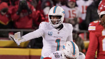 Jan 13, 2024; Kansas City, Missouri, USA; Miami Dolphins quarterback Tua Tagovailoa (1) gestures at the line of scrimmage against the Kansas City Chiefs in a 2024 AFC wild card game at GEHA Field at Arrowhead Stadium. Mandatory Credit: Denny Medley-USA TODAY Sports