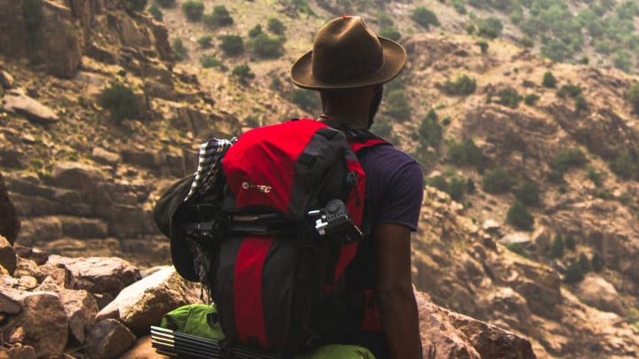 Hiker Carrying a Pack on the Trail