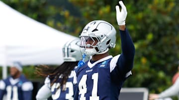 Jun 10, 2025; Arlington, TX, USA;  Dallas Cowboys defensive end Donovan Ezeiruaku (41) goes through a drill during practice at the Ford Center at the Star Training Facility in Frisco, Texas. Mandatory Credit: Chris Jones-Imagn Images