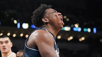Mar 24, 2024; Indianapolis, IN, USA; Utah State Aggies forward Great Osobor (1) reacts during the second half against the Purdue Boilermakers at Gainbridge FieldHouse. Mandatory Credit: Robert Goddin-Imagn Images