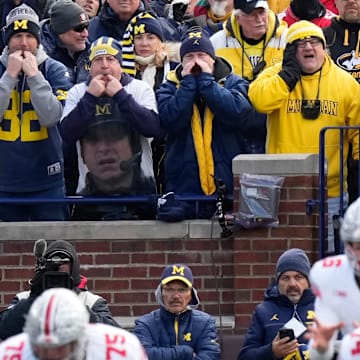 Nov 25, 2023; Ann Arbor, Michigan, USA; Michigan Wolverines fans cheer during the NCAA football game against the Ohio State Buckeyes at Michigan Stadium. Ohio State lost 30-24.