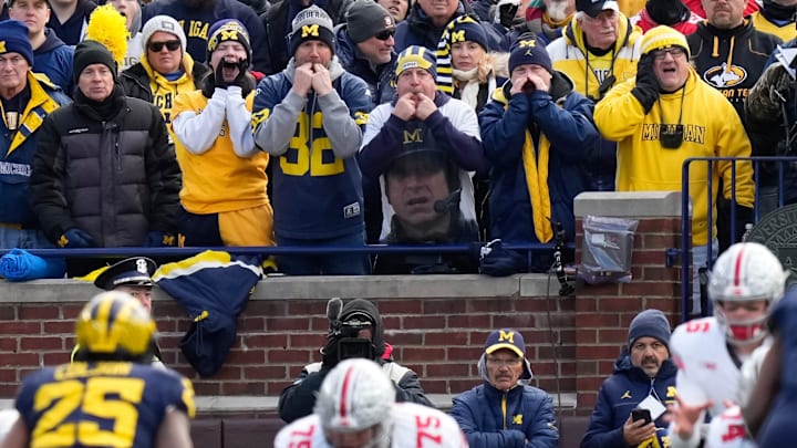 Nov 25, 2023; Ann Arbor, Michigan, USA; Michigan Wolverines fans cheer during the NCAA football game against the Ohio State Buckeyes at Michigan Stadium. Ohio State lost 30-24.