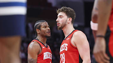 Feb 21, 2025; Houston, Texas, USA; Houston Rockets guard Jalen Green (4) talks with center Alperen Sengun (28) after a play during the third quarter against the Minnesota Timberwolves at Toyota Center. Mandatory Credit: Troy Taormina-Imagn Images