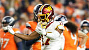 Nov 30, 2025; Landover, Maryland, USA; Washington Commanders wide receiver Terry McLaurin (17) reacts after a catch against the Denver Broncos in the second quarter of the game at Northwest Stadium. Mandatory Credit: Geoff Burke-Imagn Images
