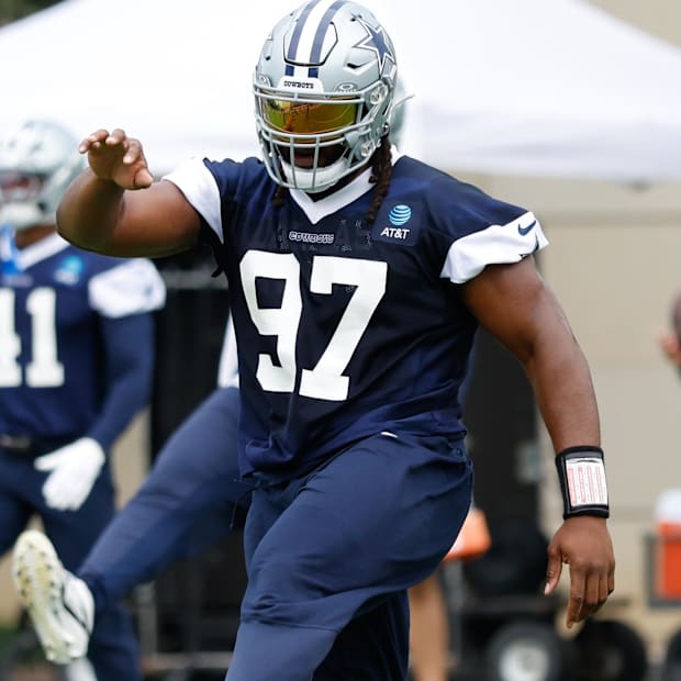 Dallas Cowboys DT Osa Odighizuwa goes through a drill during practice at the Ford Center at the Star Training Facility