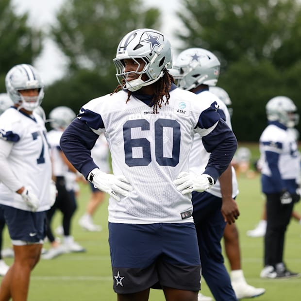 Dallas Cowboys offensive tackle Tyler Guyton goes through a drill during practice at the Ford Center at the Star T