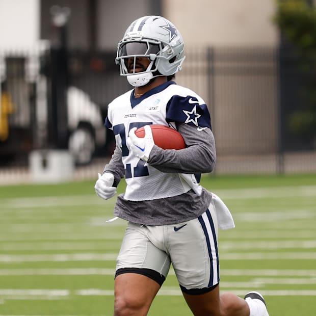Dallas Cowboys running back Miles Sanders goes through a drill during practice at the Ford Center at The Star 