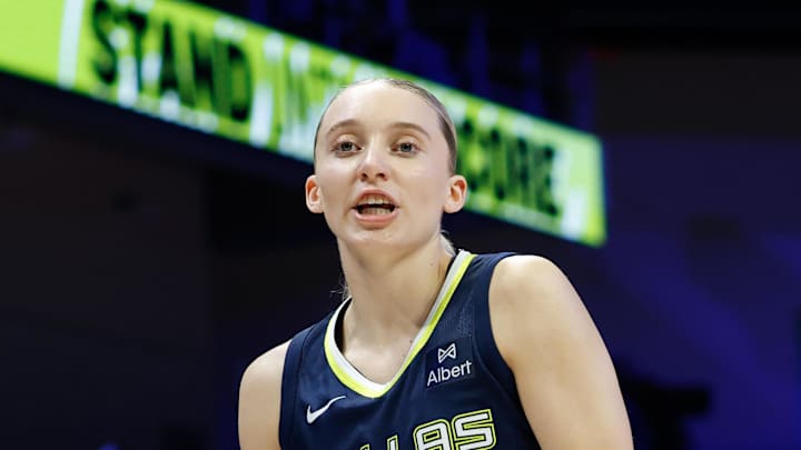 Aug 22, 2025; Arlington, Texas, USA;  Dallas Wings guard Paige Bueckers (5) reacts against the Seattle Storm during the second half at College Park Center. Mandatory Credit: Chris Jones-Imagn Images