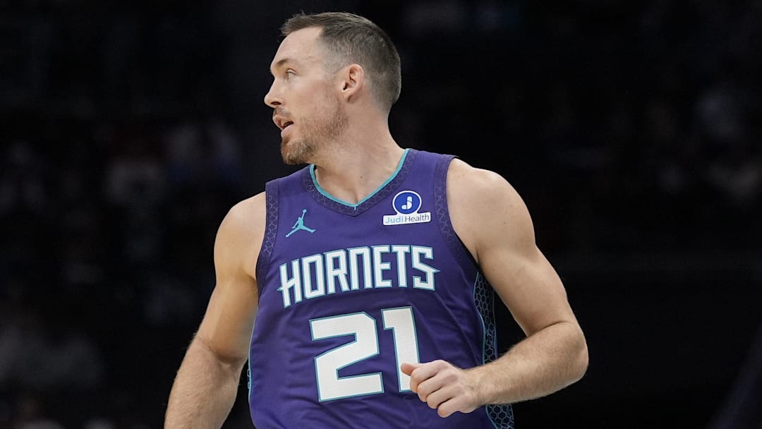 Nov 2, 2025; Charlotte, North Carolina, USA; Charlotte Hornets guard Pat Connaughton (21) runs up court during the second quarter against the Utah Jazz at Spectrum Center. Mandatory Credit: Jim Dedmon-Imagn Images