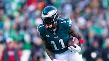 Dec 31, 2023; Philadelphia, Pennsylvania, USA; Philadelphia Eagles wide receiver A.J. Brown (11) runs with the ball during the fourth quarter against the Arizona Cardinals at Lincoln Financial Field. Mandatory Credit: Bill Streicher-Imagn Images