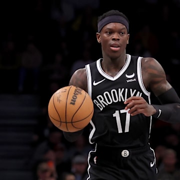 Apr 10, 2024; Brooklyn, New York, USA; Brooklyn Nets guard Dennis Schroder (17) brings the ball up court against the Toronto Raptors during the first quarter at Barclays Center. Mandatory Credit: Brad Penner-Imagn Images