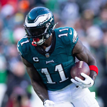 Dec 31, 2023; Philadelphia, Pennsylvania, USA; Philadelphia Eagles wide receiver A.J. Brown (11) runs with the ball during the fourth quarter against the Arizona Cardinals at Lincoln Financial Field.  