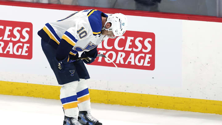 May 4, 2025; Winnipeg, Manitoba, CAN; St. Louis Blues center Brayden Schenn (10) reacts to the team’s double overtime loss to the Winnipeg Jets in game seven of the first round of the 2025 Stanley Cup Playoffs at Canada Life Centre. Mandatory Credit: James Carey Lauder-Imagn Images
