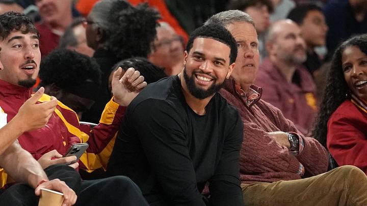 Feb 18, 2026; Los Angeles, California, USA; Chicago Bears quarterback Caleb Williams watches in the second half of the game between the Illinois Fighting Illini and the Southern California Trojans at Galen Center. Mandatory Credit: Kirby Lee-Imagn Images