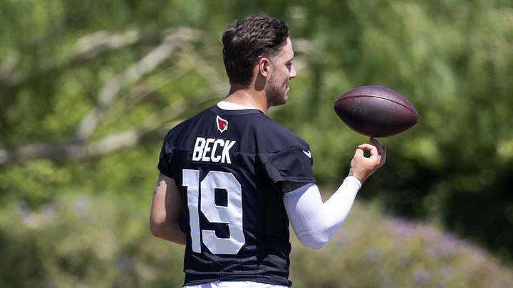 May 8, 2026; Tempe, AZ, USA; Arizona Cardinals quarterback Carson Beck (19) spins a football on his finger during rookie minicamp at Dignity Health Arizona Cardinals Training Center. Mandatory Credit: Mark J. Rebilas-Imagn Images