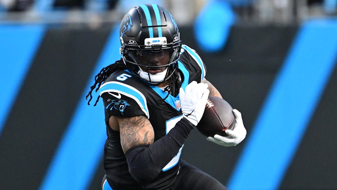 Dec 21, 2025; Charlotte, North Carolina, USA; Carolina Panthers running back Rico Dowdle (5) with the ball in the fourth quarter at Bank of America Stadium. Mandatory Credit: Bob Donnan-Imagn Images