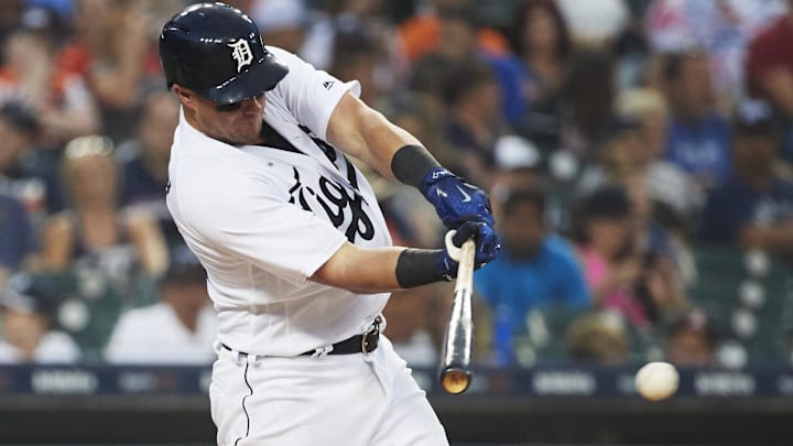 Former Detroit Tigers catcher James McCann (34) hits a single in the seventh inning against the Minnesota Twins at Comerica Park.
