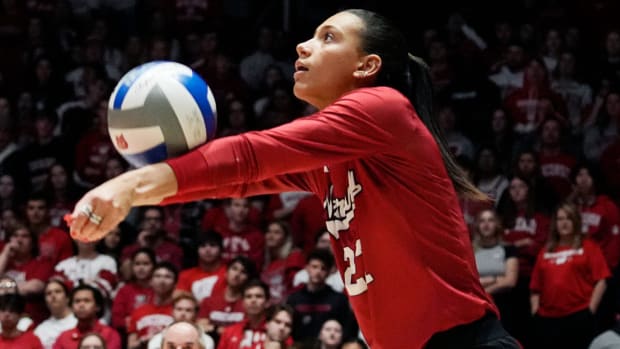 Nebraska outside hitter Harper Murray (27) passes the ball during the third set of the game against the Wisconsin