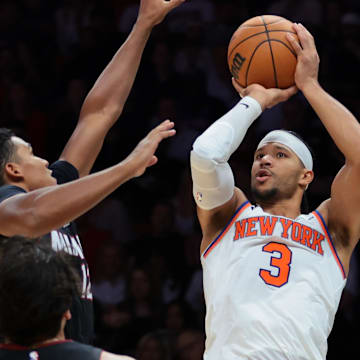 Oct 26, 2025; Miami, Florida, USA; New York Knicks guard Josh Hart (3) shoots the basketball over Miami Heat guard Dru Smith (12) and forward Jaime Jaquez Jr. (11) during the third quarter at Kaseya Center. Mandatory Credit: Sam Navarro-Imagn Images