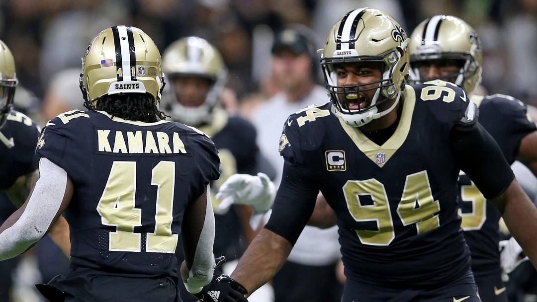 Dec 3, 2017; New Orleans, LA, USA; New Orleans Saints running back Alvin Kamara (41) is congratulated by linebacker Manti Te'o (51) and defensive end Cameron Jordan (94) after a third quarter touchdown against the Carolina Panthers in at the Mercedes-Benz Superdome. Mandatory Credit: Chuck Cook-Imagn Images