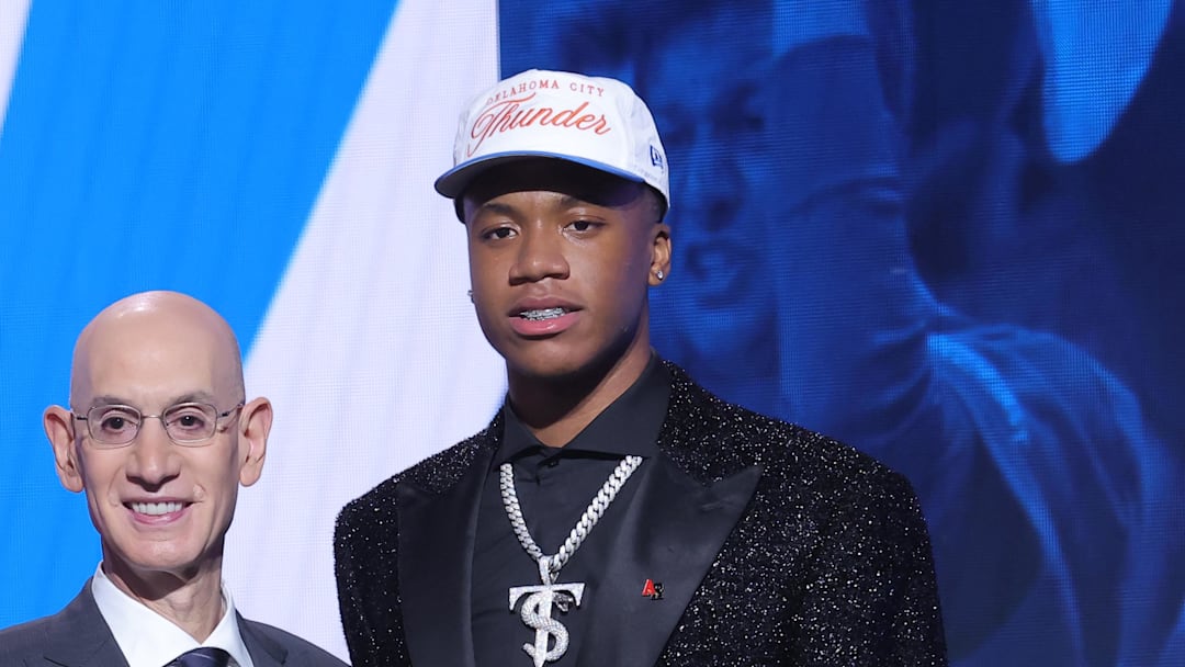 Jun 25, 2025; Brooklyn, NY, USA;  Thomas Sorber stands with NBA commissioner Adam Silver after being selected as the 15th pick by the Oklahoma City Thunder in the first round of the 2025 NBA Draft at Barclays Center. Mandatory Credit: Brad Penner-Imagn Images
