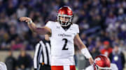 Nov 23, 2024; Manhattan, Kansas, USA; Cincinnati Bearcats quarterback Brendan Sorsby (2) calls a play at the line of scrimmage against the Kansas State Wildcats at Bill Snyder Family Football Stadium. Mandatory Credit: Scott Sewell-Imagn Images
