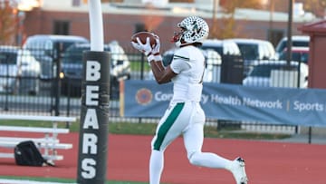 Lawrence North Monshun Sales (1) does some practice pass receptions as Lawrence North took on Lawrence Central in the S6 IHSAA high school football sectional semifinal, Nov 1, 2024; Indianapolis, IN, USA; at Lawrence Central High School.