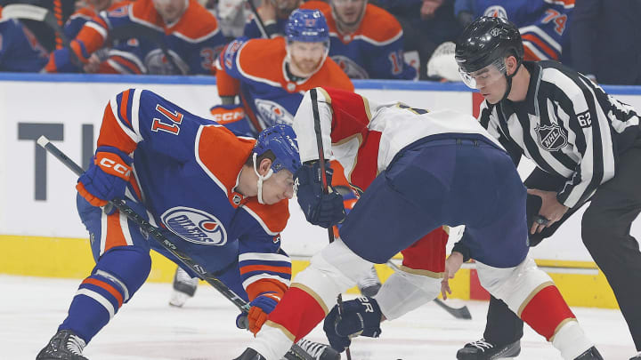 Edmonton Oilers 71/ and Florida Panthers forward Kevin Stenlund (82)