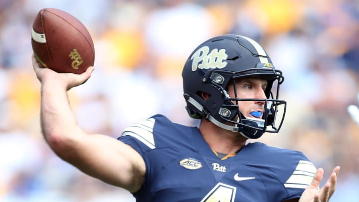 Sep 10, 2016; Pittsburgh, PA, USA;  Pittsburgh Panthers quarterback Nathan Peterman (4) passes the ball against the Penn State Nittany Lions during the third quarter at Heinz Field. PITT won 42-39. Mandatory Credit: Charles LeClaire-USA TODAY Sports