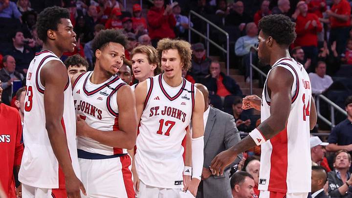 Oct 25, 2026; New York, NY, USA;  St. John's Red Storm forward Keyshawn Hall (7) celebrates with his teammates after scoring in the second half against the Texas Longhorns at Madison Square Garden.