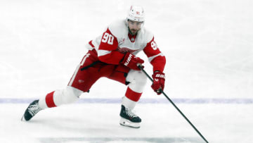 Mar 17, 2024; Pittsburgh, Pennsylvania, USA;  Detroit Red Wings center Joe Veleno (90) skates with the puck against the Pittsburgh Penguins during the third period at PPG Paints Arena. Pittsburgh won 6-3. Mandatory Credit: Charles LeClaire-USA TODAY Sports