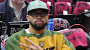 Apr 16, 2025; Chicago, Illinois, USA; Chicago Bears quarterback Caleb Williams during the first half of a game between the Chicago Bulls and the Miami Heat at United Center. Mandatory Credit: David Banks-Imagn Images