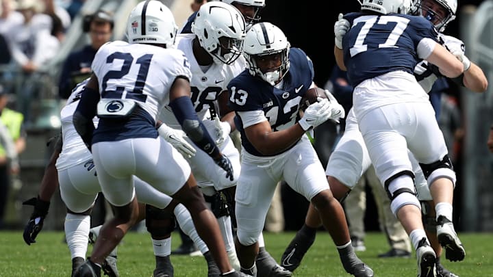 Penn State football running back Kaytron Allen runs with the ball during the Blue White spring game at Beaver Stadium.