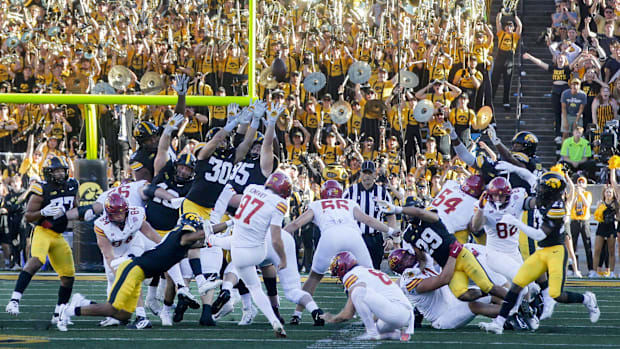 Iowa State’s Kyle Konrardy (97) kicks the game-winning field goal against Iowa during Saturday's Cy-Hawk game at Kinnick Stad