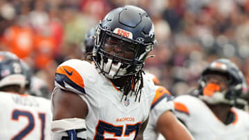 Denver Broncos linebacker Dre Greenlaw (57) reacts after a play during the first half against the Houston Texans at NRG Stadium. 