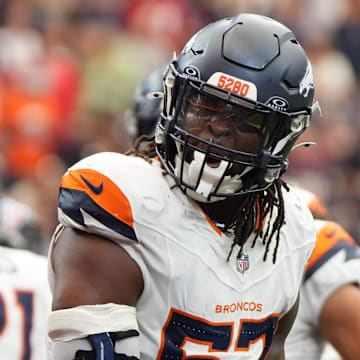 Denver Broncos linebacker Dre Greenlaw (57) reacts after a play during the first half against the Houston Texans at NRG Stadium. 