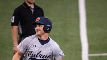 Auburn Tigers catcher Ike Irish (18) runs from third base to home to score a run for the Tigers in the third inning as the Texas Longhorns take on the Auburn in the first game of a three-game series on Thursday night at UFCU Disch-Falk Field in Austin, April 17, 2025.