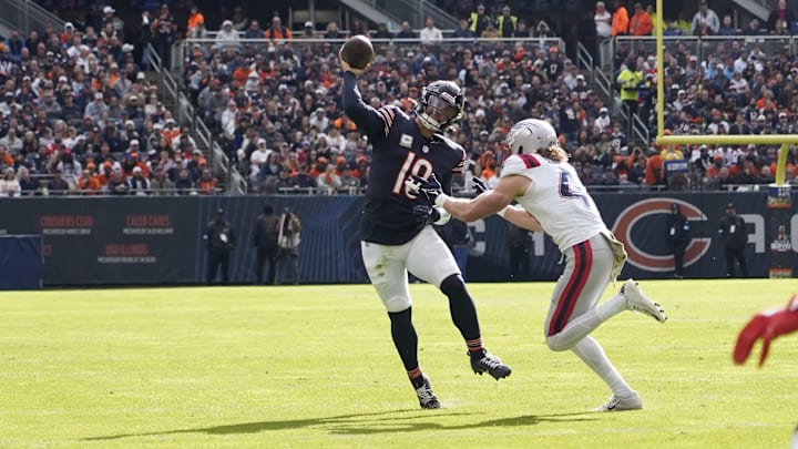 Chicago Bears quarterback Caleb Williams passes against the New England Patriots during the first half at Soldier Field. Chicago Bears quarterback Caleb Williams passes against the New England Patriots during the first half at Soldier Field.