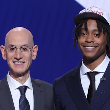 Jun 25, 2025; Brooklyn, NY, USA;  Tre Johnson stands with NBA commissioner Adam Silver after being selected as the sixth pick by the Washington Wizards in the first round of the 2025 NBA Draft at Barclays Center. Mandatory Credit: Brad Penner-Imagn Images